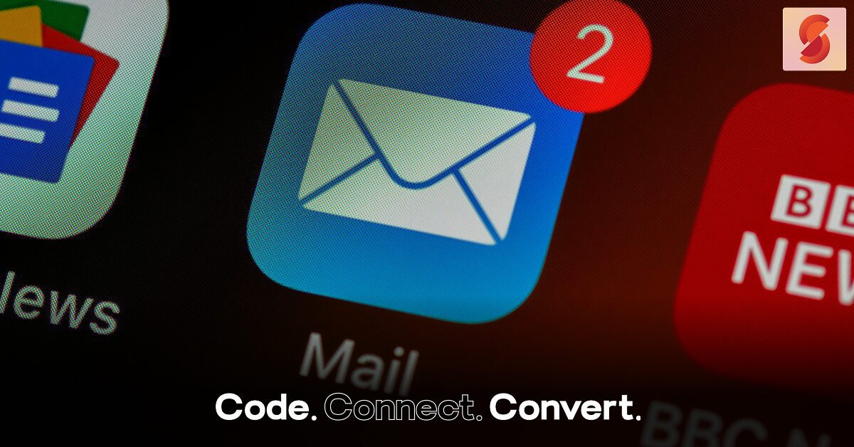 A close-up of a smartphone screen focusing on the Mail app icon, which has a red notification badge showing the number two, indicating two unread messages.