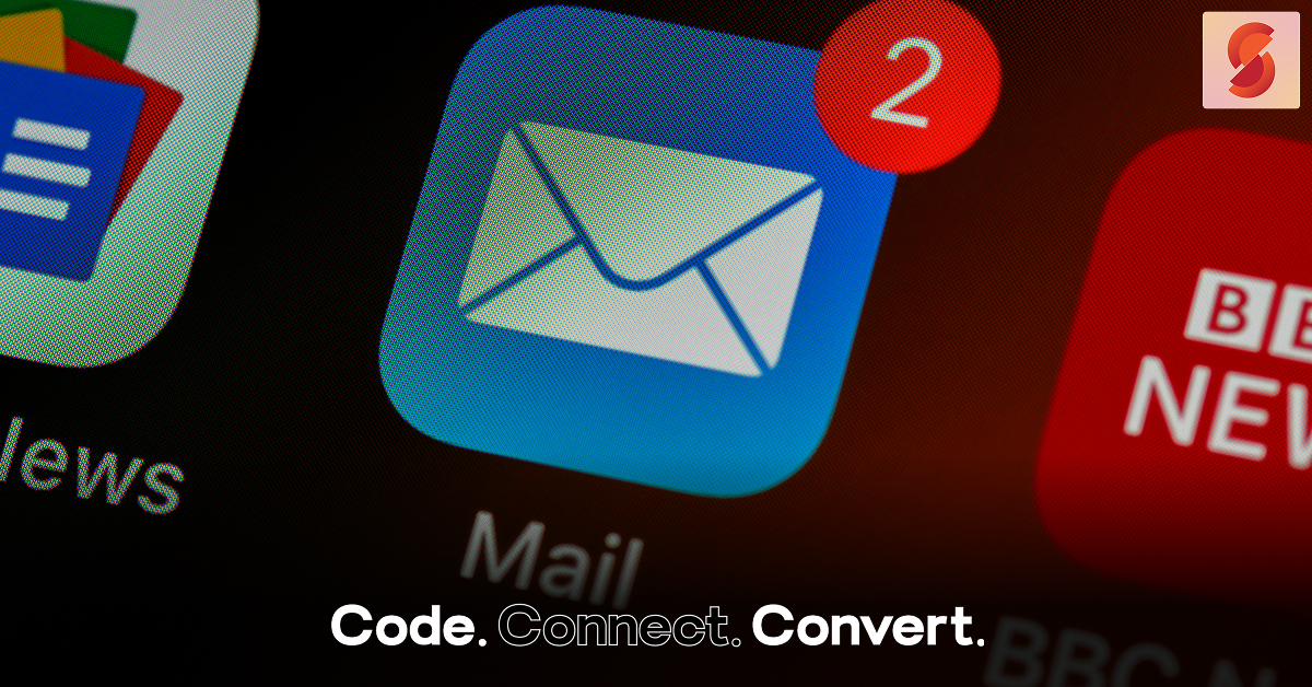 A close-up of a smartphone screen focusing on the Mail app icon, which has a red notification badge showing the number two, indicating two unread messages.